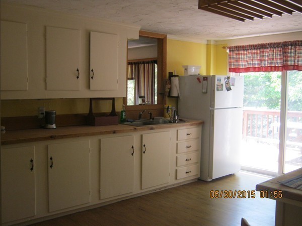 226 West Road Ashby, MA 01431 - Photo 11 of 28 a kitchen with cabinets appliances and a window