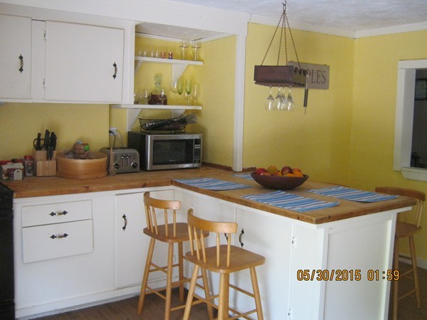 226 West Road Ashby, MA 01431 - Photo 12 of 28 a kitchen with stainless steel appliances a stove a sink and a refrigerator