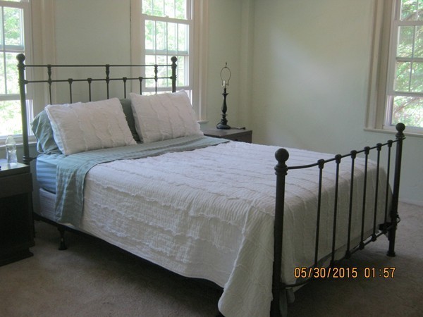 226 West Road Ashby, MA 01431 - Photo 18 of 28 a bedroom with a bed next to a window