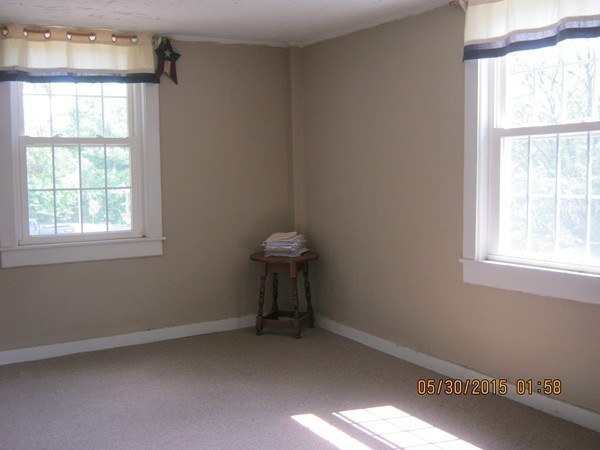 226 West Road Ashby, MA 01431 - Photo 20 of 28 a room that has a window in it
