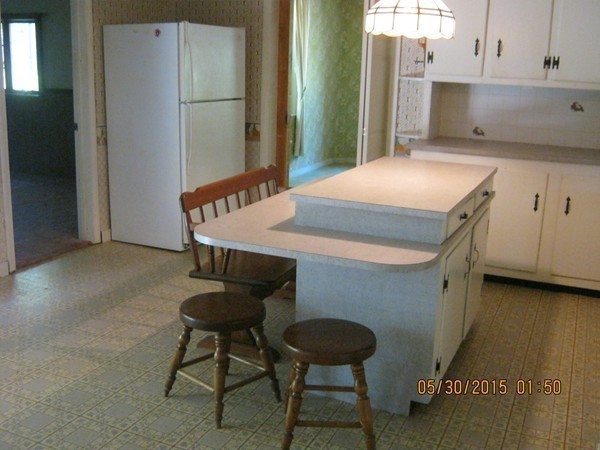 226 West Road Ashby, MA 01431 - Photo 7 of 28 a kitchen with stainless steel appliances a refrigerator and a stove