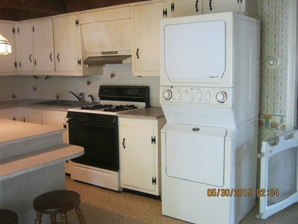 226 West Road Ashby, MA 01431 - Photo 8 of 28 a kitchen with a stove and white cabinets