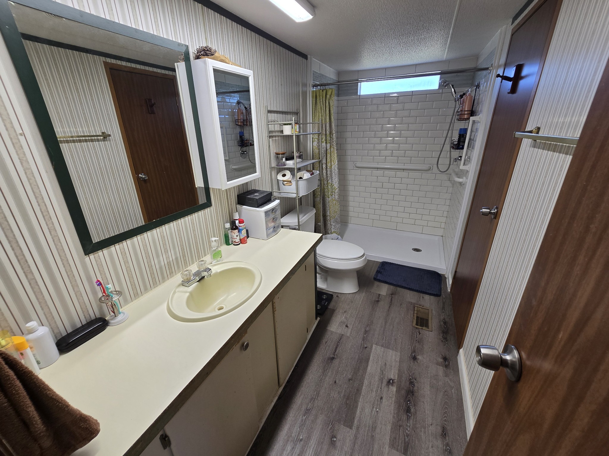 2285 Nancy Green Ridge Road Prospect, TN 38477 - Photo 12 of 17 a bathroom with a sink a toilet and shower