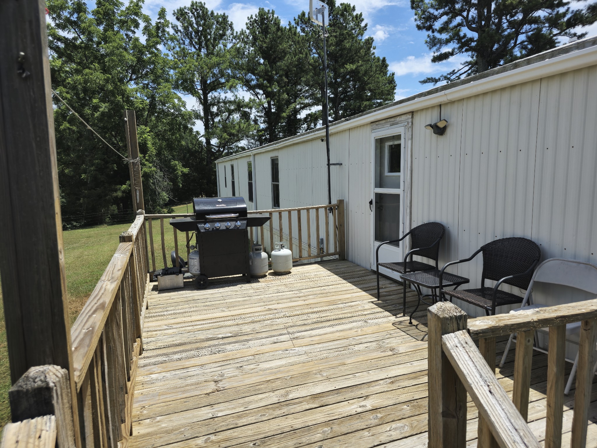 2285 Nancy Green Ridge Road Prospect, TN 38477 - Photo 16 of 17 a view of a patio with a table chairs and couches