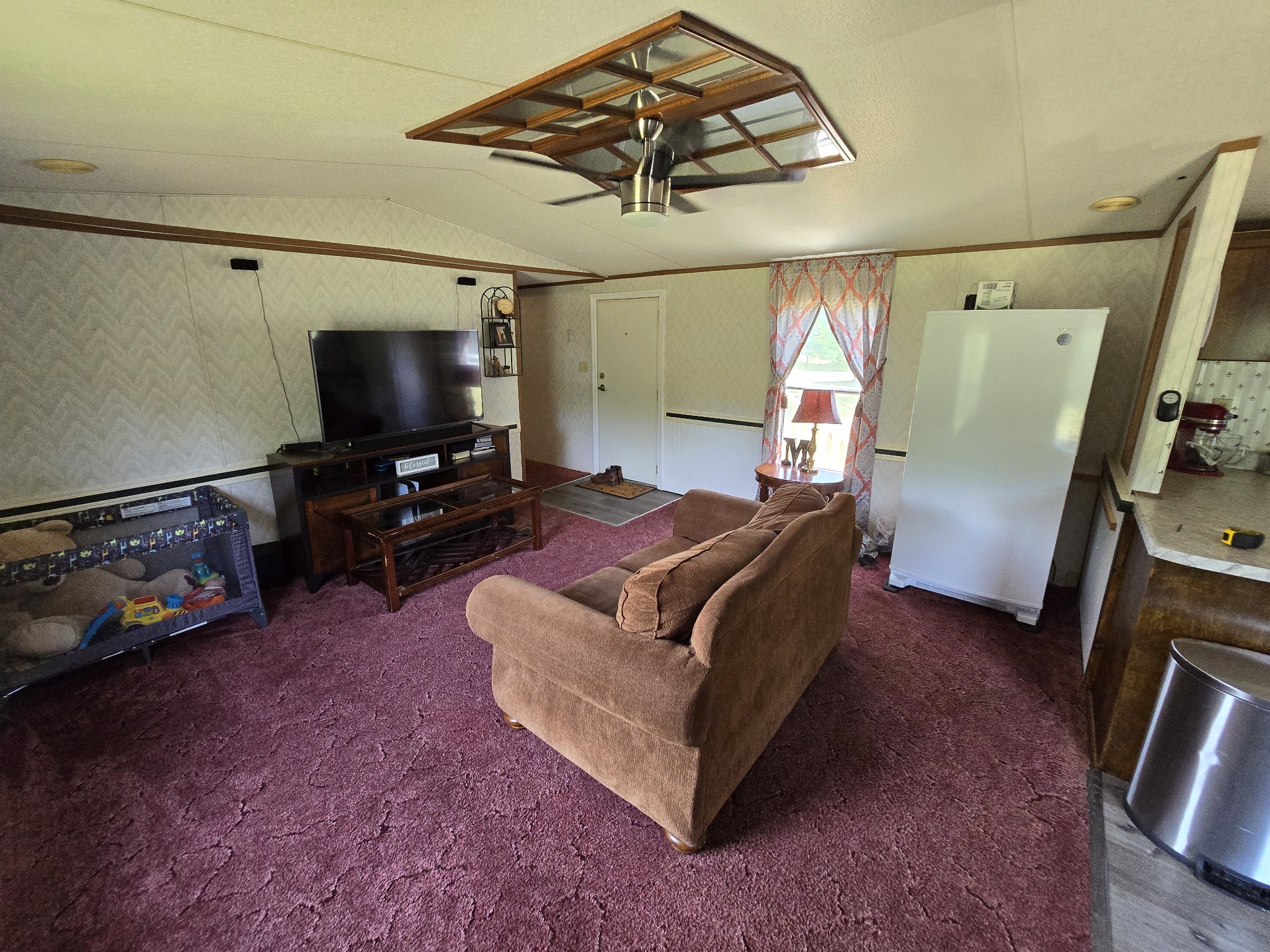 2285 Nancy Green Ridge Road Prospect, TN 38477 - Photo 3 of 17 a living room with furniture and a flat screen tv