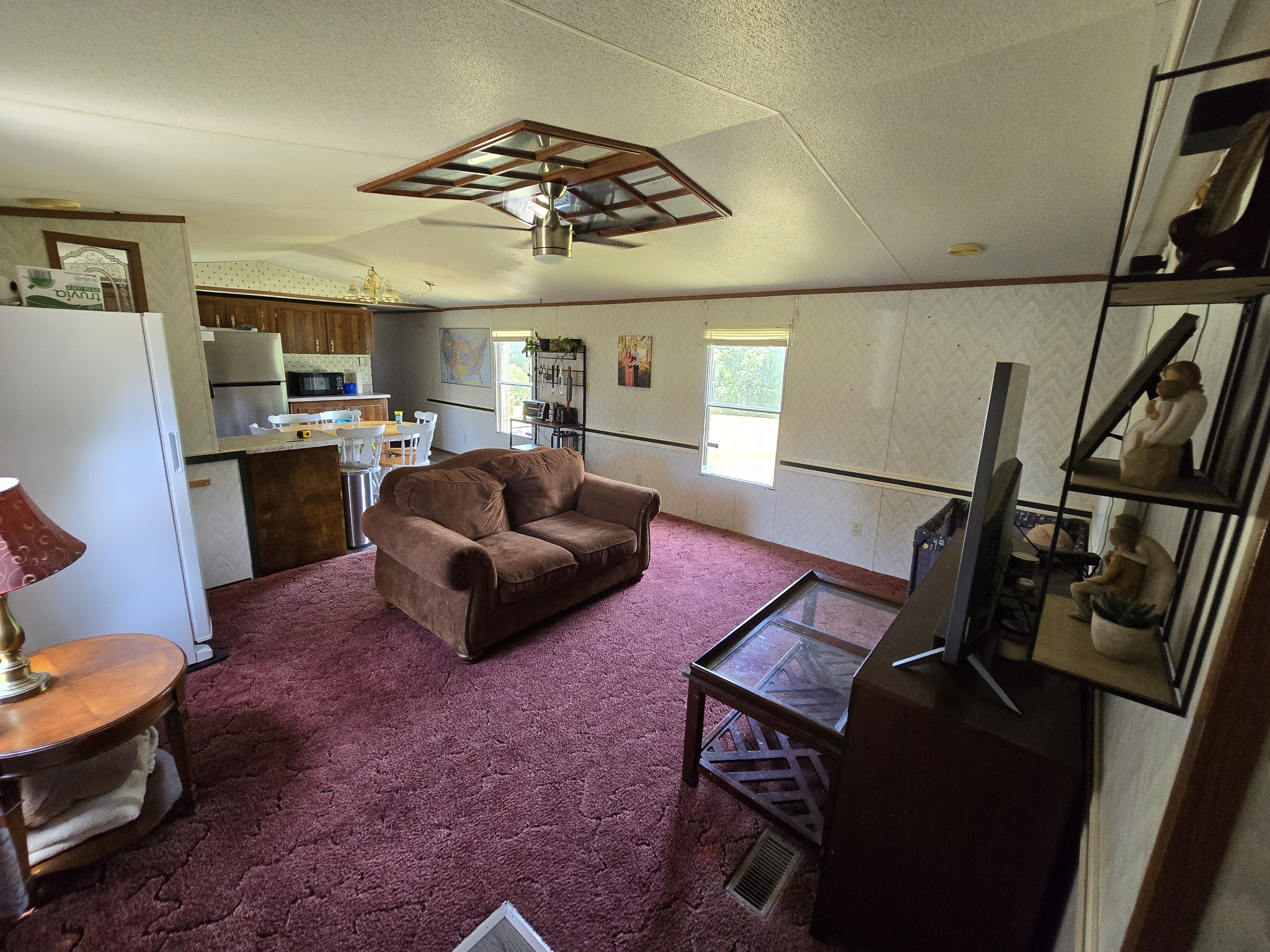 2285 Nancy Green Ridge Road Prospect, TN 38477 - Photo 4 of 17 a living room with furniture and a chandelier
