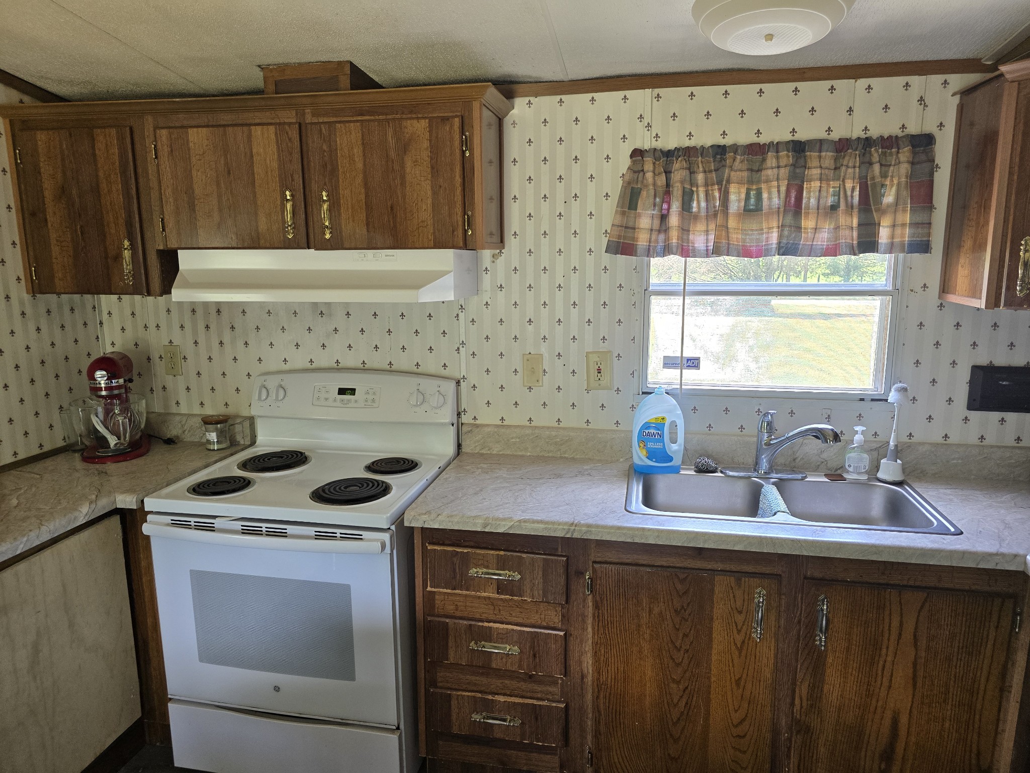 2285 Nancy Green Ridge Road Prospect, TN 38477 - Photo 6 of 17 a kitchen with a sink cabinets and window