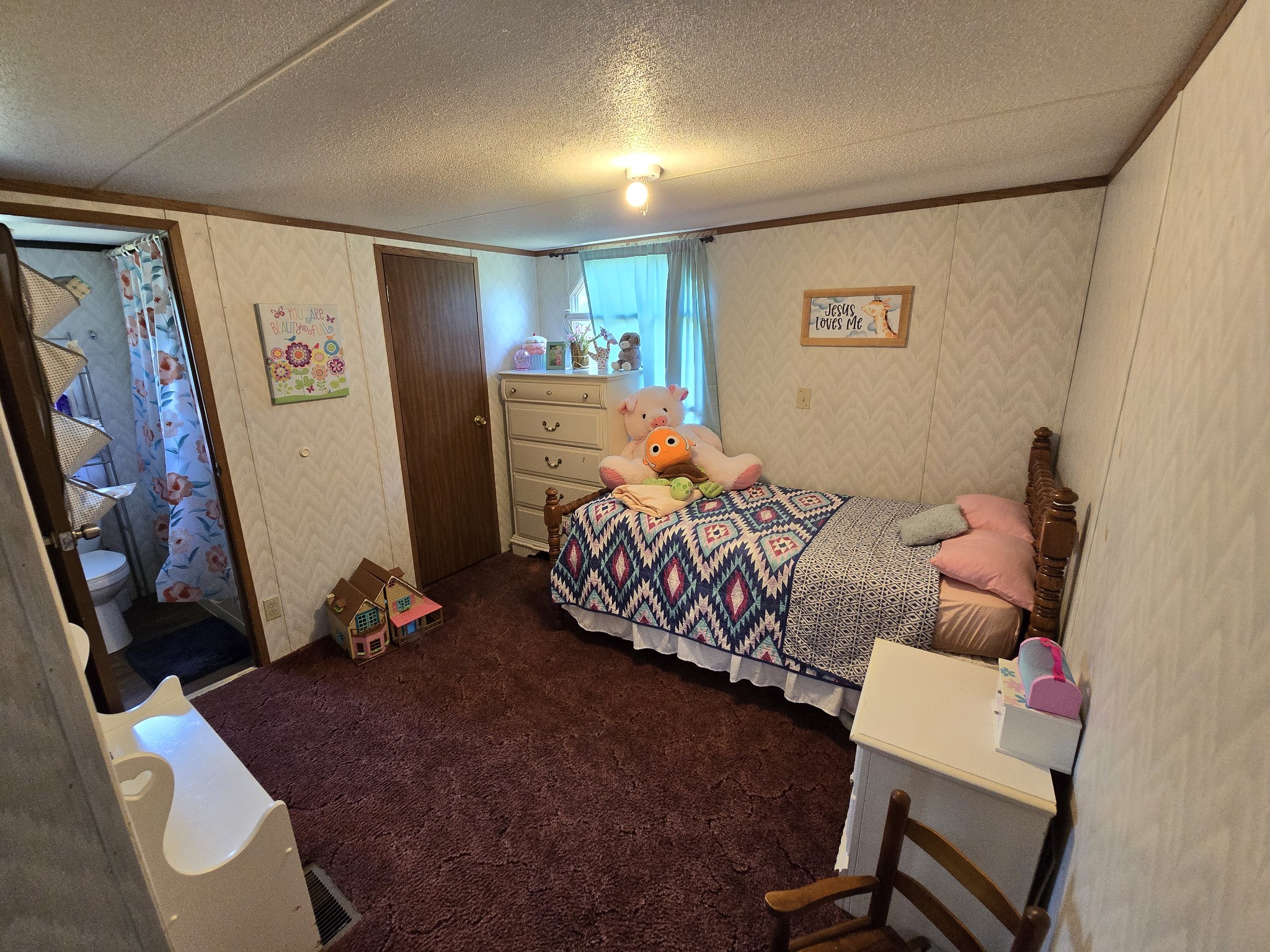2285 Nancy Green Ridge Road Prospect, TN 38477 - Photo 8 of 17 a bedroom with furniture and a window