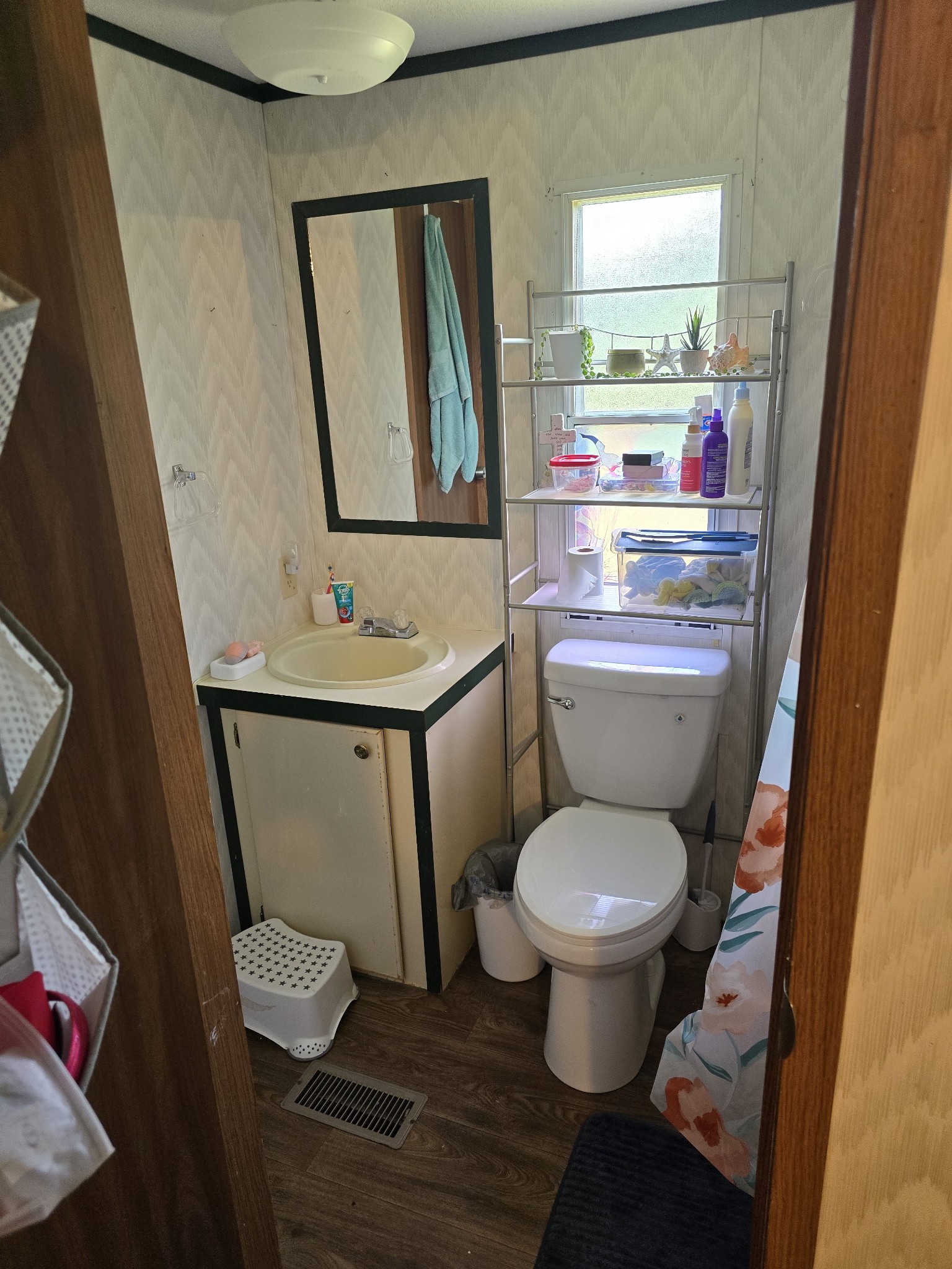 2285 Nancy Green Ridge Road Prospect, TN 38477 - Photo 9 of 17 a bathroom with a toilet sink and a mirror