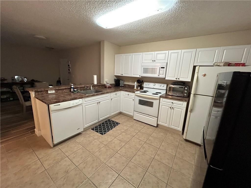 5861 Riverside Drive, Unit 103 Coral Springs, FL 33067 - Photo 7 of 7 Photo 7