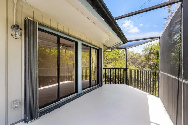 a balcony with furniture