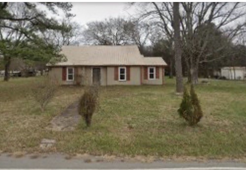 front view of house with a yard