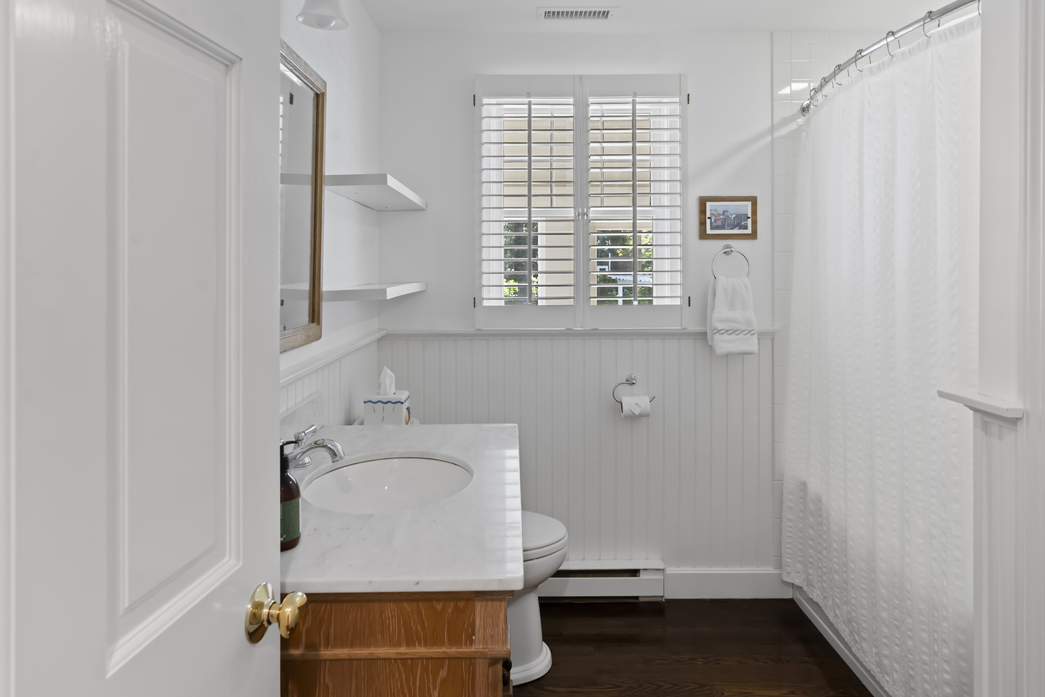 21 Kitts Field Circle Edgartown, MA 02539 - Photo 16 of 34 a bathroom with a sink and a window