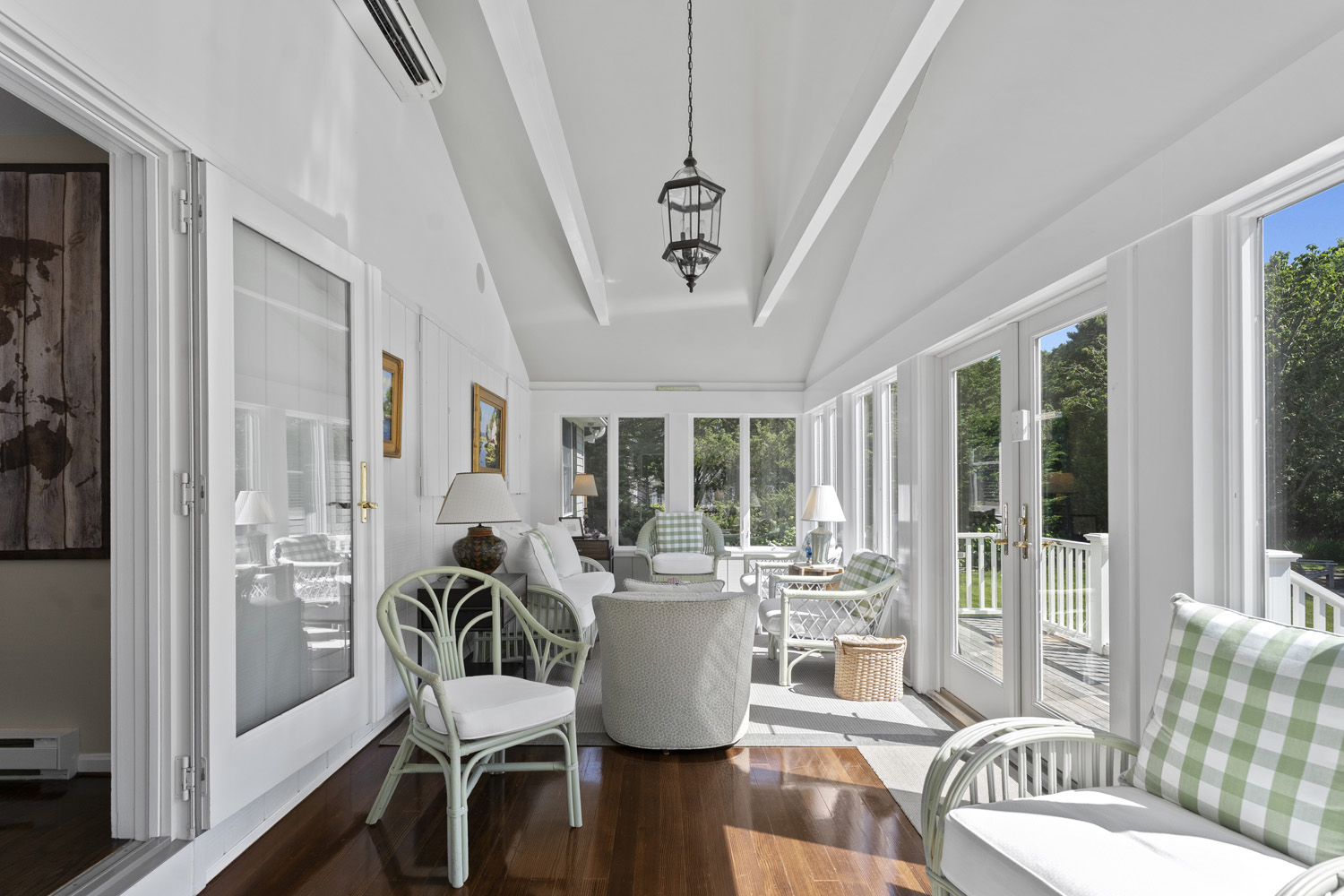 21 Kitts Field Circle Edgartown, MA 02539 - Photo 17 of 34 a dining room with furniture a chandelier and wooden floor