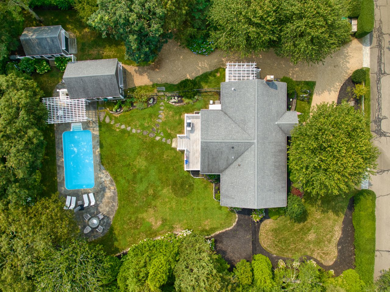 21 Kitts Field Circle Edgartown, MA 02539 - Photo 24 of 34 an aerial view of a house with yard swimming pool and outdoor seating