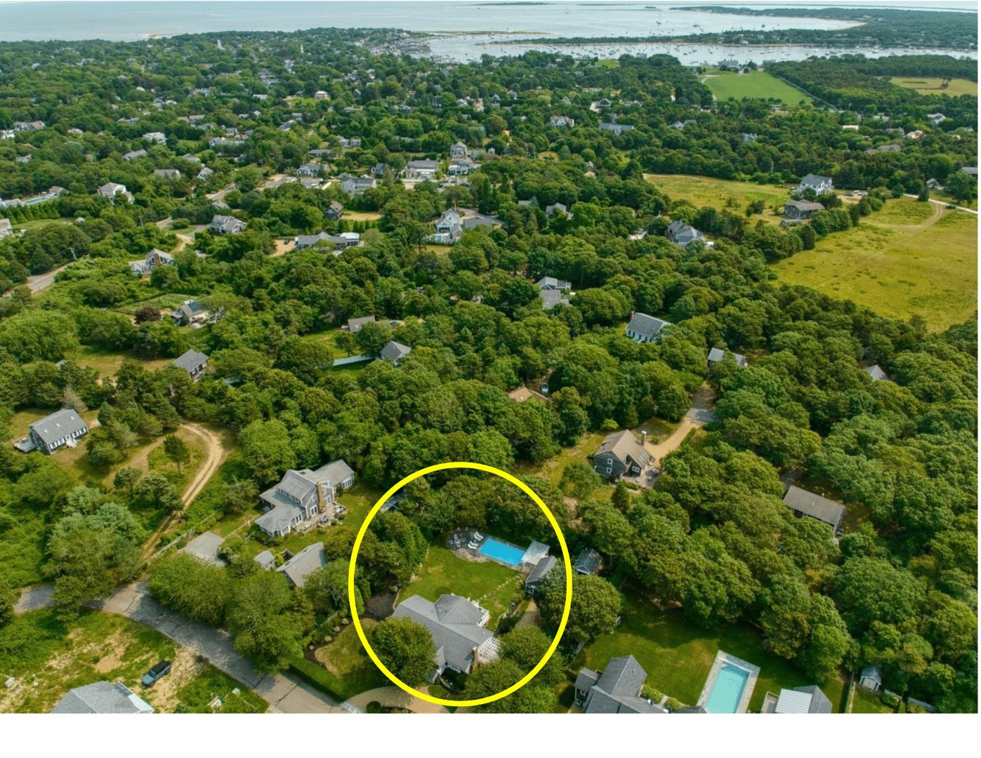 21 Kitts Field Circle Edgartown, MA 02539 - Photo 34 of 34 a aerial view of a house with a garden and trees