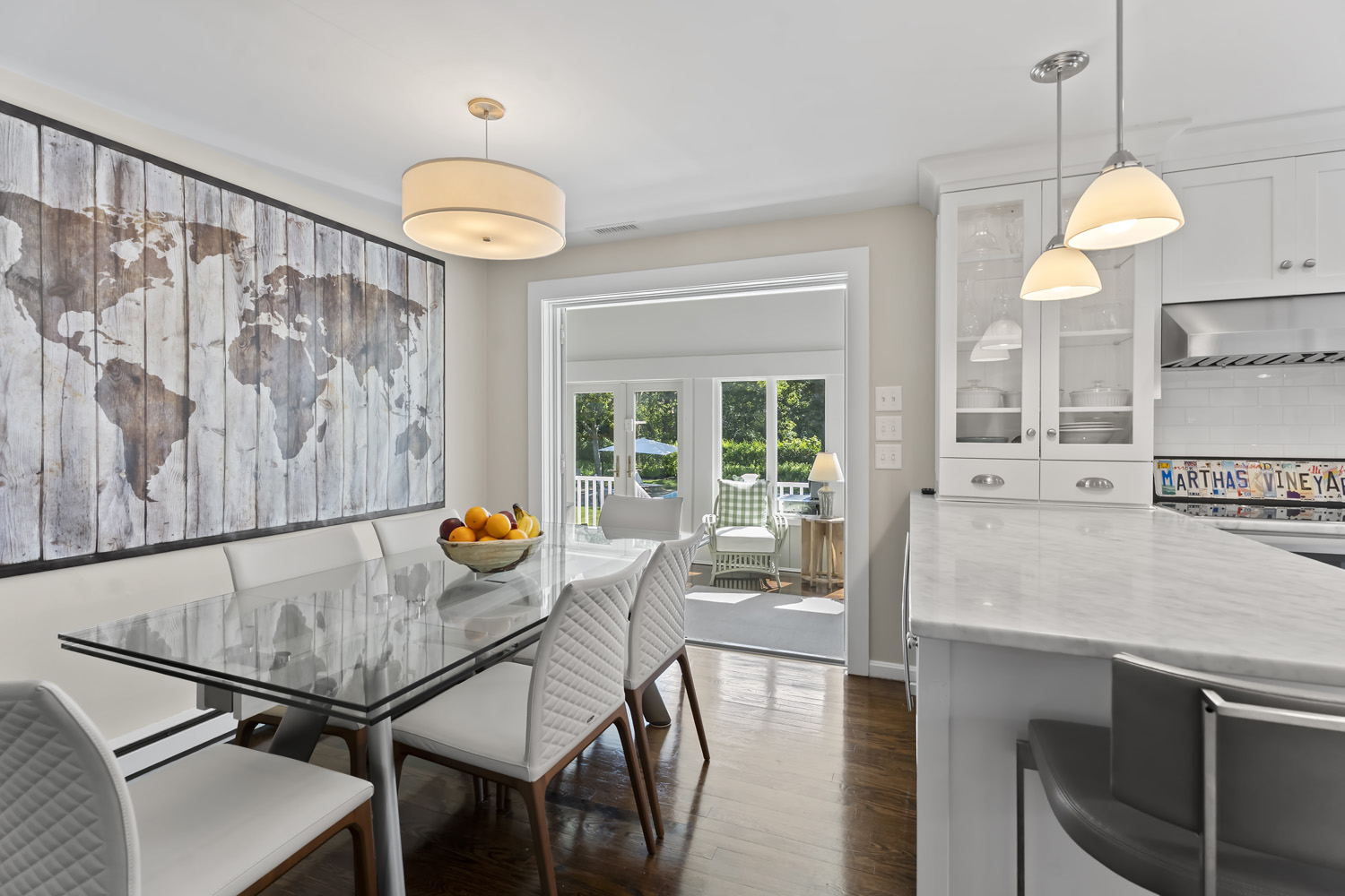 21 Kitts Field Circle Edgartown, MA 02539 - Photo 8 of 34 a view of a dining room with furniture and a chandelier