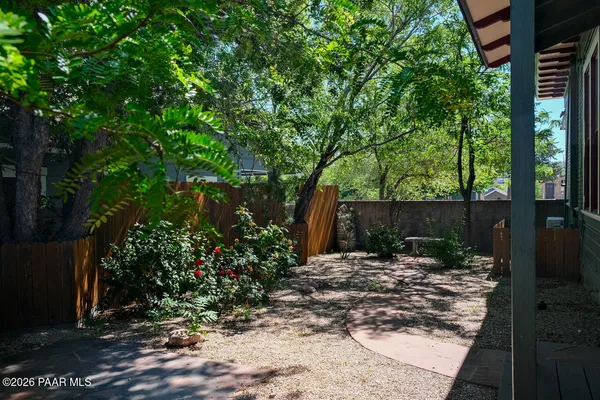 a backyard of a house with lots of green space