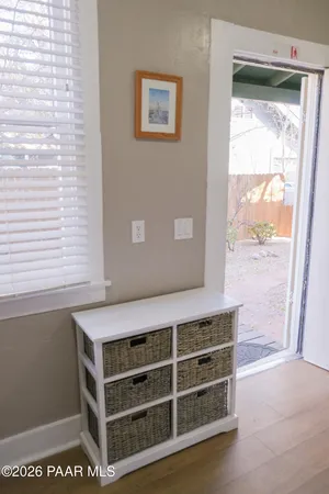a view of an empty room with a window