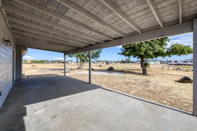 a view of a house with a patio