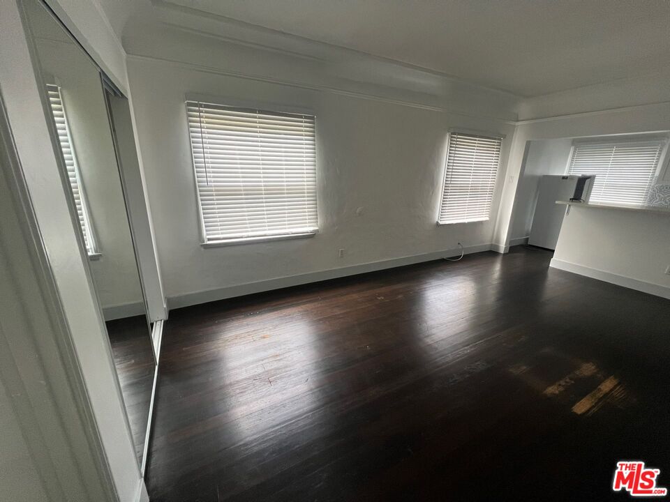 1217 Cedar Avenue Long Beach, CA 90813 - Photo 12 of 15 wooden floor in an empty room with a window