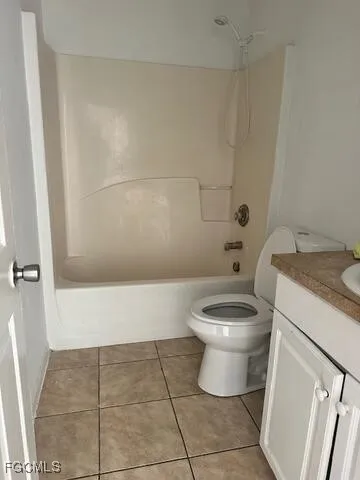 a bathroom with a toilet a sink and bathtub