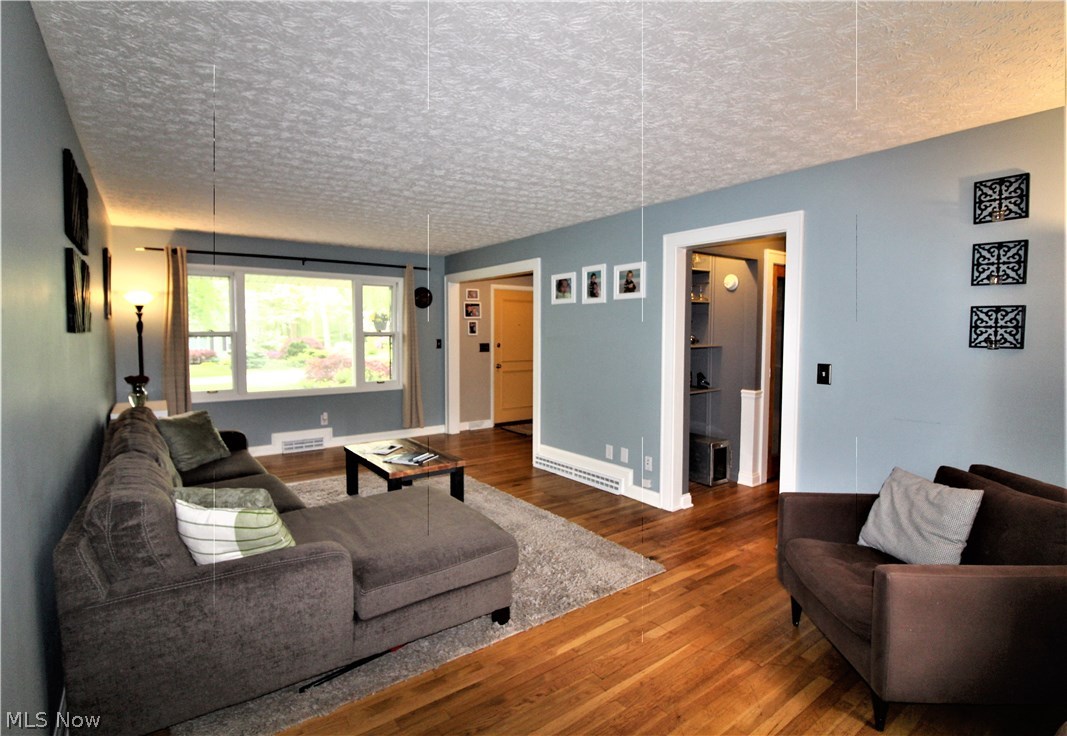 2887 Lee Road Silver Lake, OH 44224 - Photo 3 of 24 Living Room with Hardwood Floor