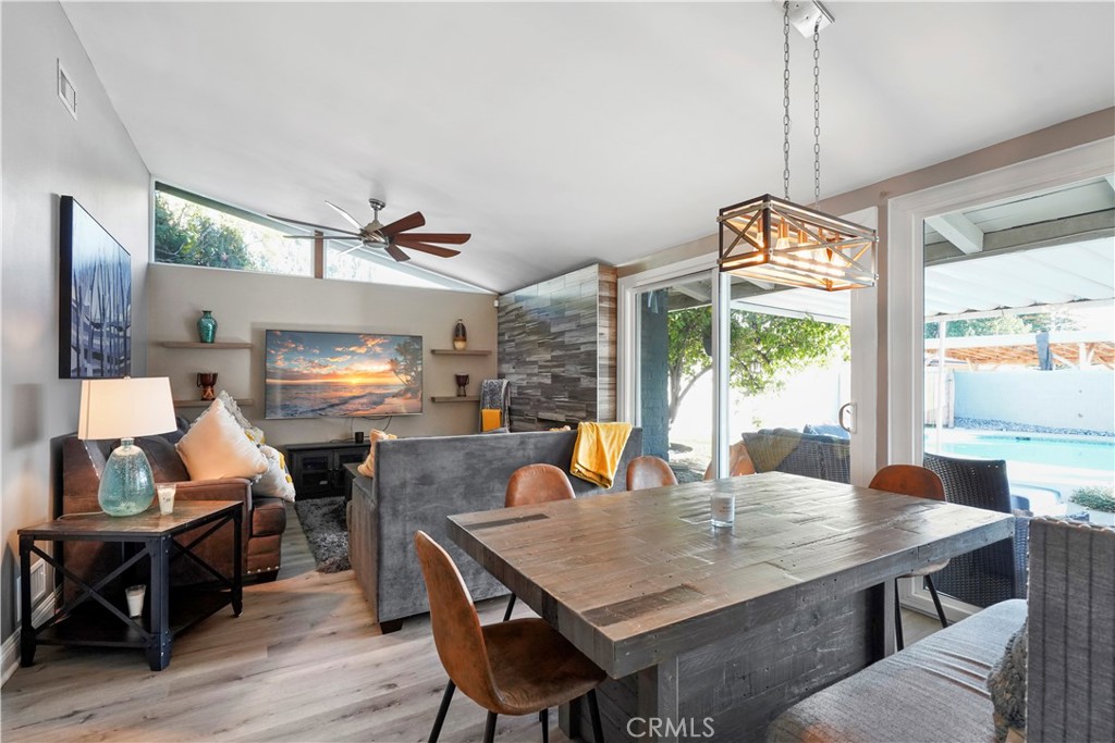 20448 Eccles Street Winnetka, CA 91306 - Photo 14 of 54 a view of a dining room with furniture window and wooden floor