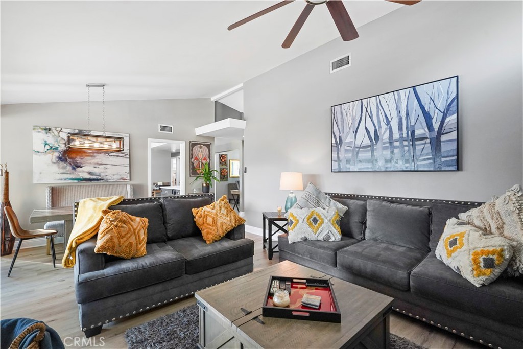 20448 Eccles Street Winnetka, CA 91306 - Photo 18 of 54 a living room with furniture and a couch