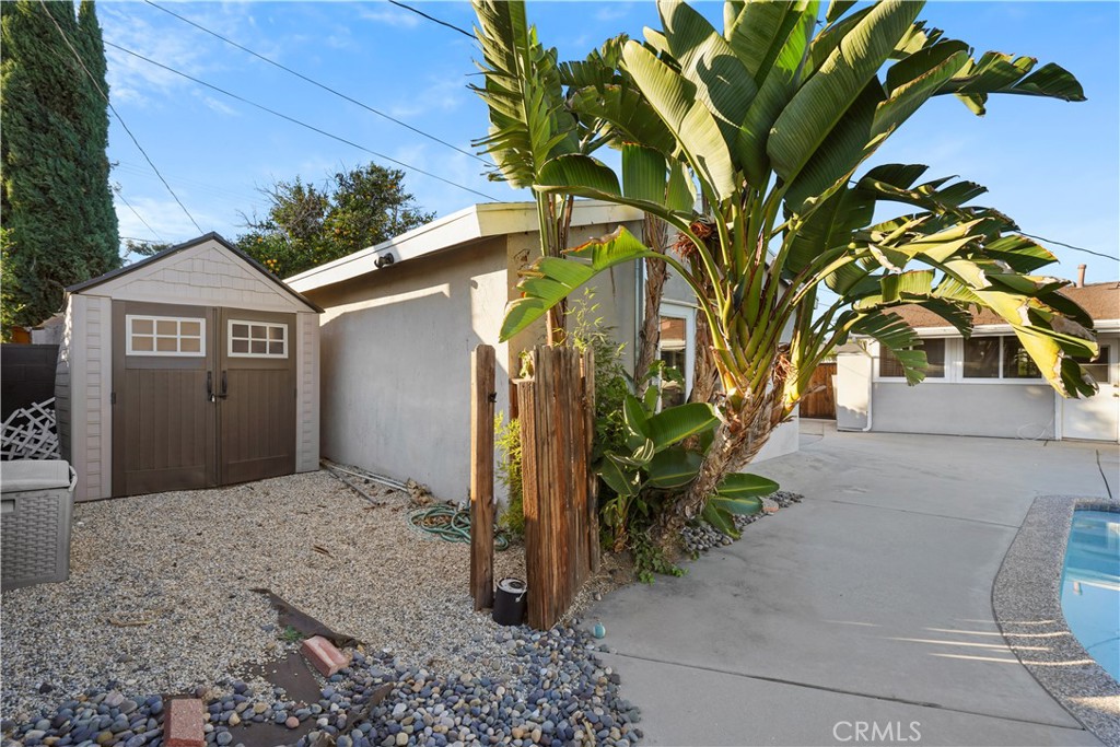 20448 Eccles Street Winnetka, CA 91306 - Photo 34 of 54 a front view of a house with a yard