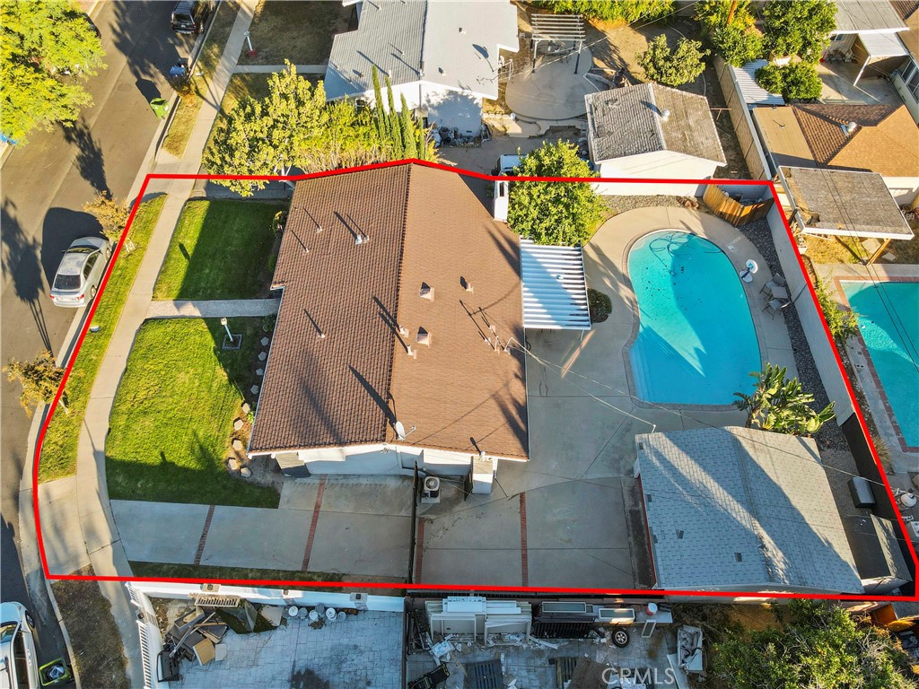 20448 Eccles Street Winnetka, CA 91306 - Photo 4 of 54 an aerial view of a house with a swimming pool