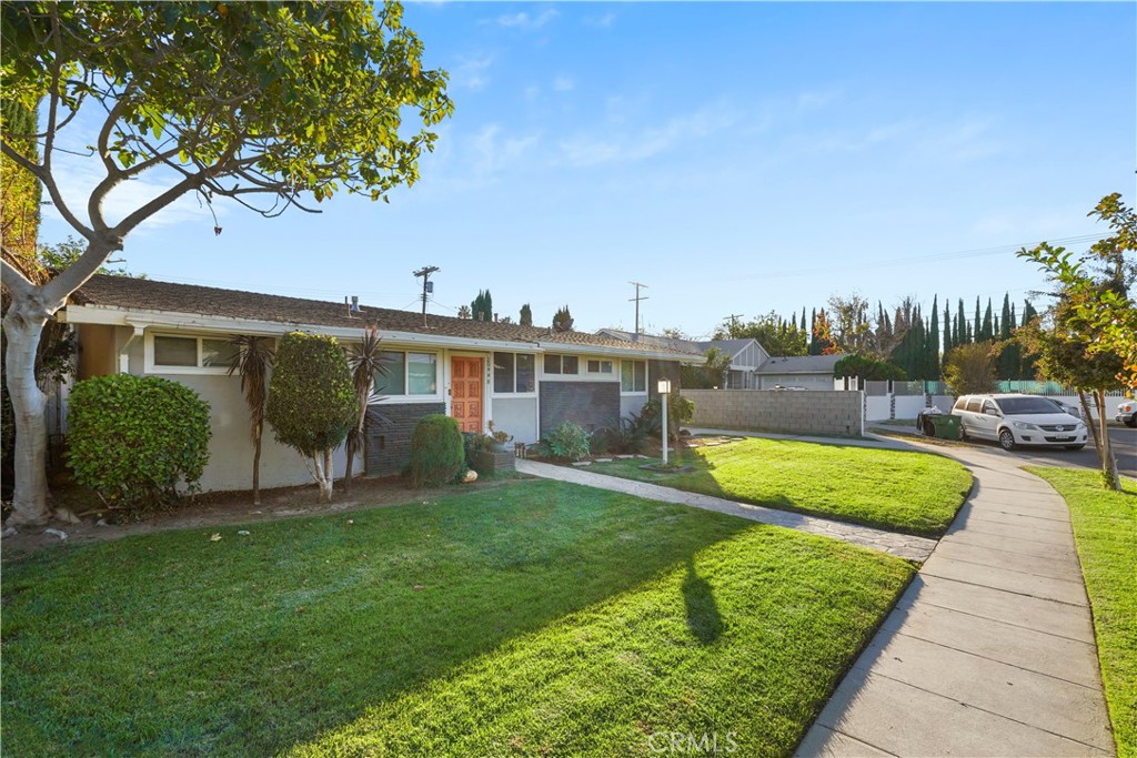 20448 Eccles Street Winnetka, CA 91306 - Photo 46 of 54 a view of a house with a swimming pool