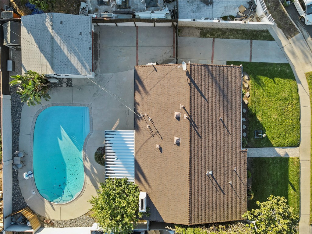 20448 Eccles Street Winnetka, CA 91306 - Photo 48 of 54 an aerial view of a house with a swimming pool