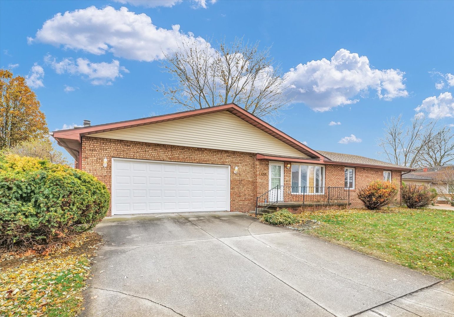 1058 North Drive Rantoul, IL 61866 - Photo 1 of 37 a front view of house with garage and yard