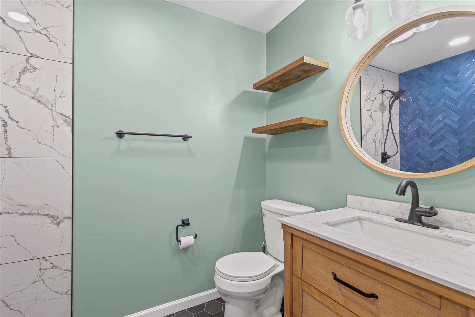 1058 North Drive Rantoul, IL 61866 - Photo 25 of 37 a bathroom with a toilet and a sink