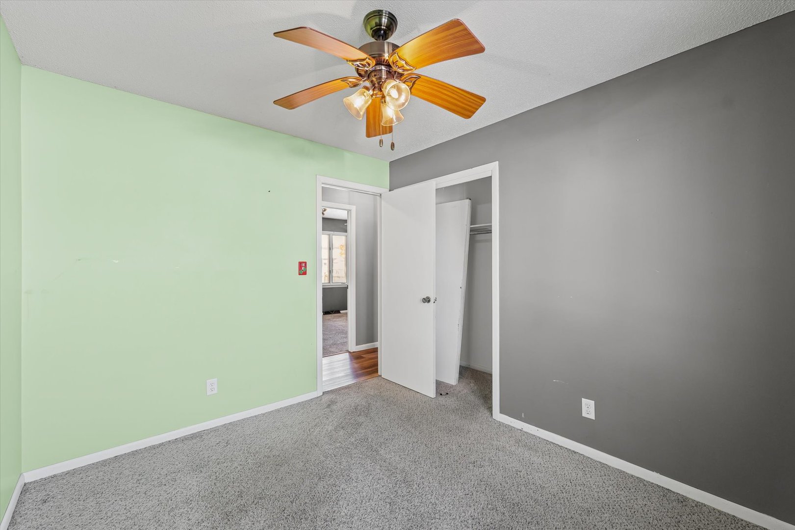 1058 North Drive Rantoul, IL 61866 - Photo 30 of 37 an empty room and chandelier fan
