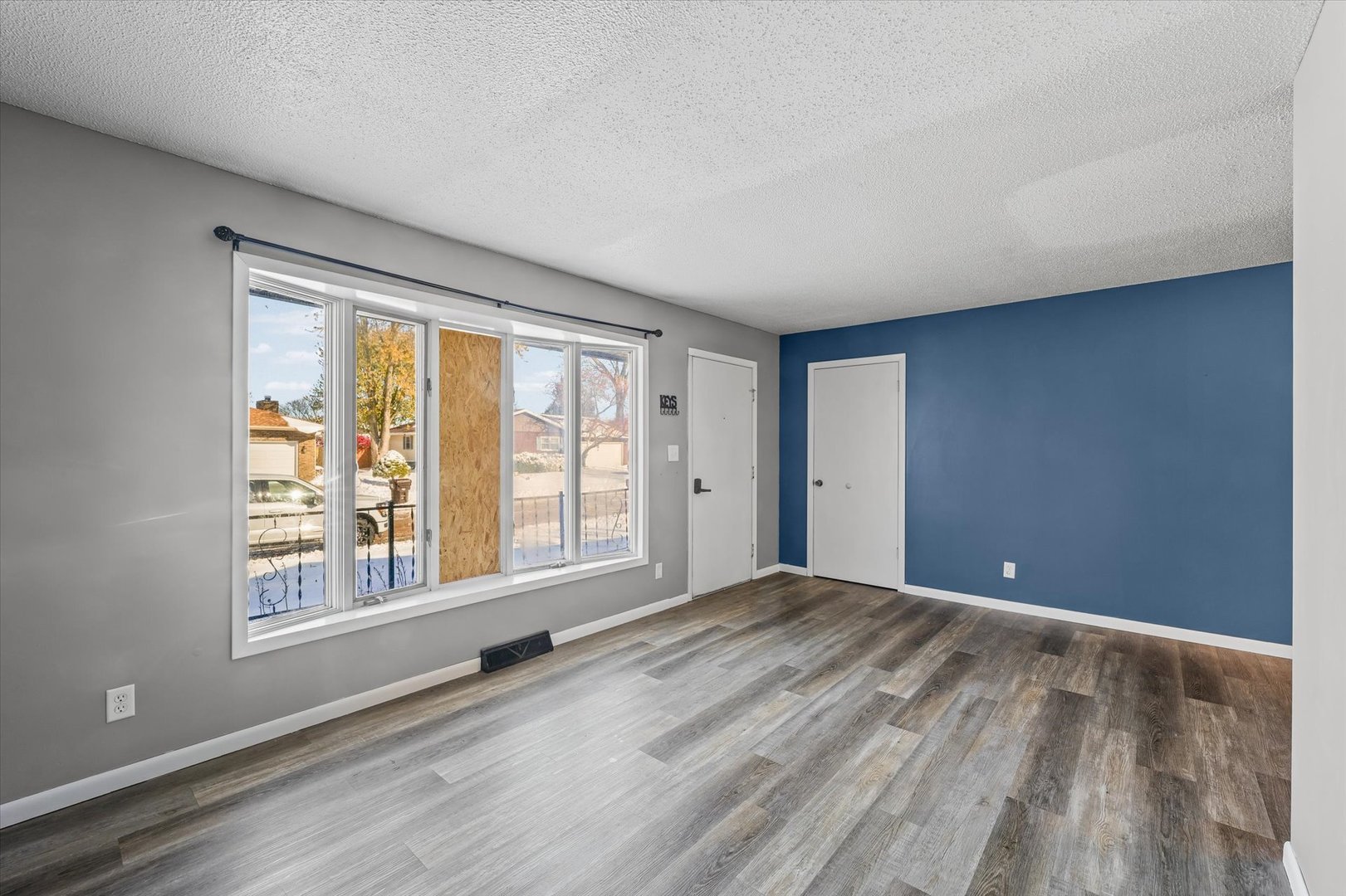 1058 North Drive Rantoul, IL 61866 - Photo 7 of 37 a view of an empty room with a window