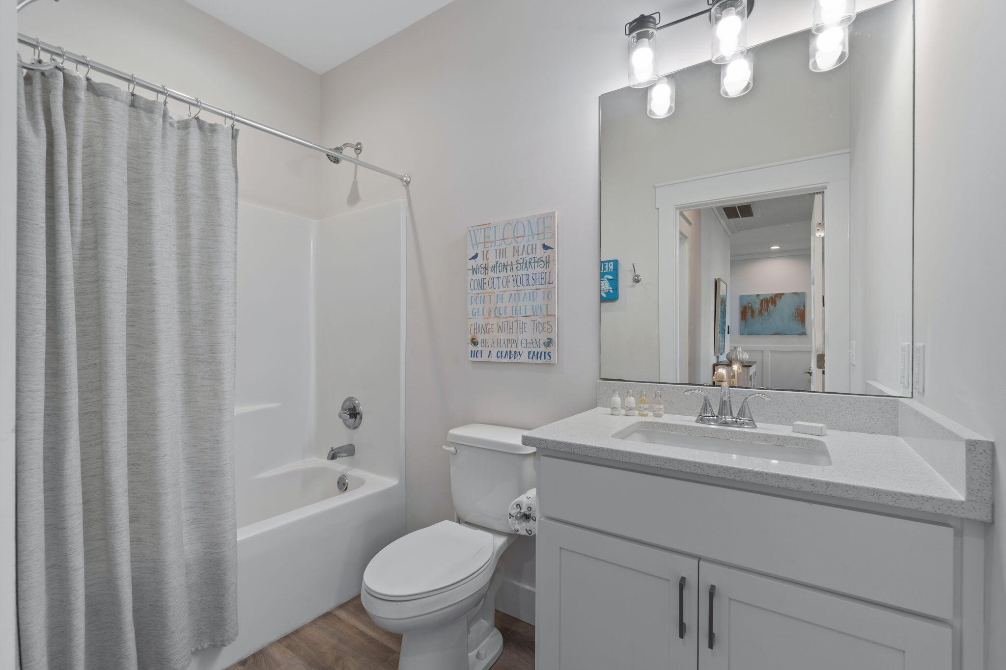 10 Blue Surf Lane Miramar Beach, FL 32550 - Photo 19 of 60 a bathroom with a sink a toilet and shower