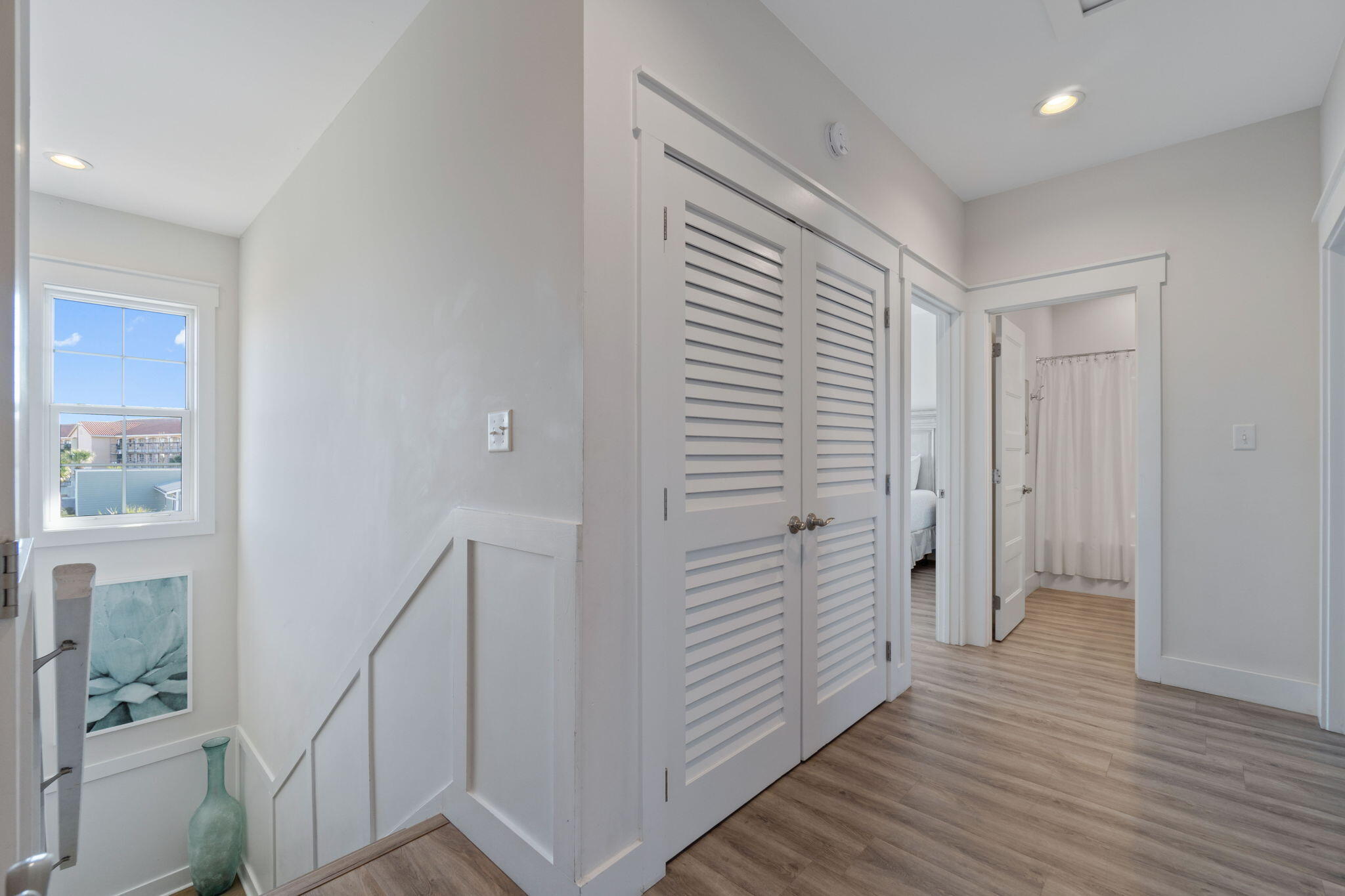 10 Blue Surf Lane Miramar Beach, FL 32550 - Photo 20 of 60 a view of a hallway with the wooden floor