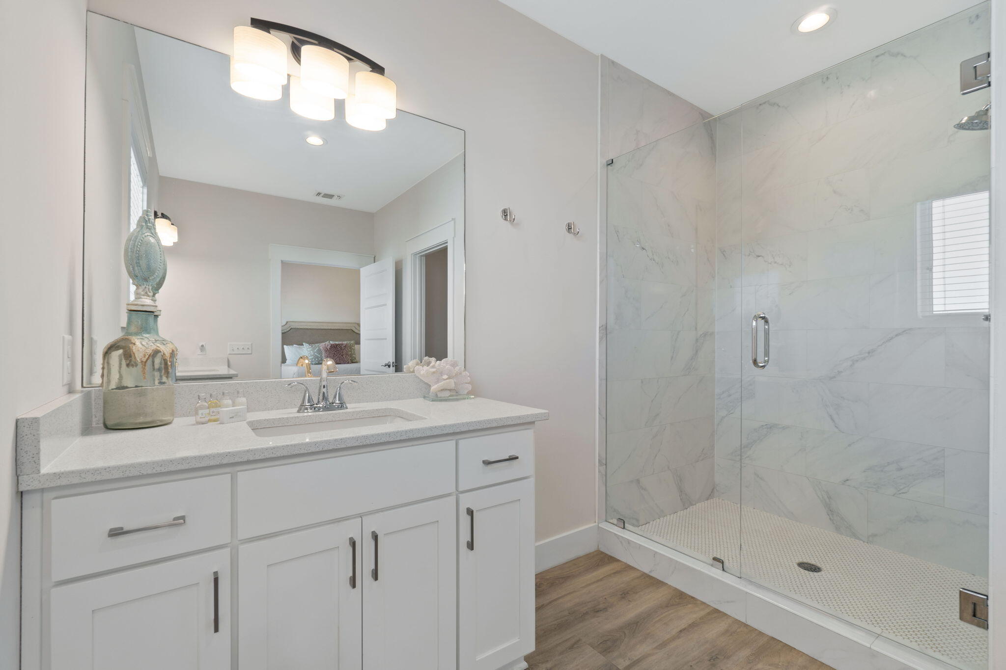 10 Blue Surf Lane Miramar Beach, FL 32550 - Photo 30 of 60 a bathroom with 2 sink shower and a mirror