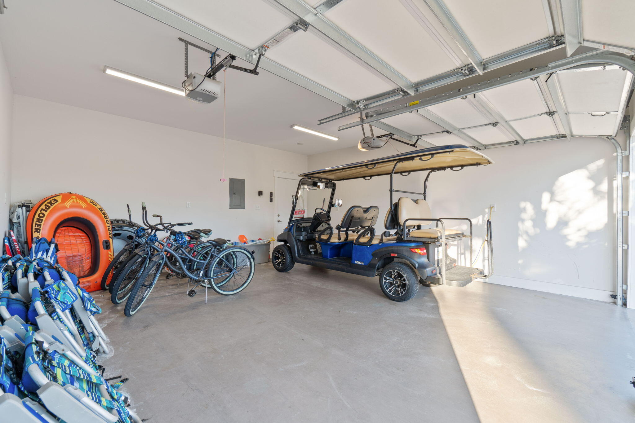 10 Blue Surf Lane Miramar Beach, FL 32550 - Photo 38 of 60 a view of a garage with a bike and car