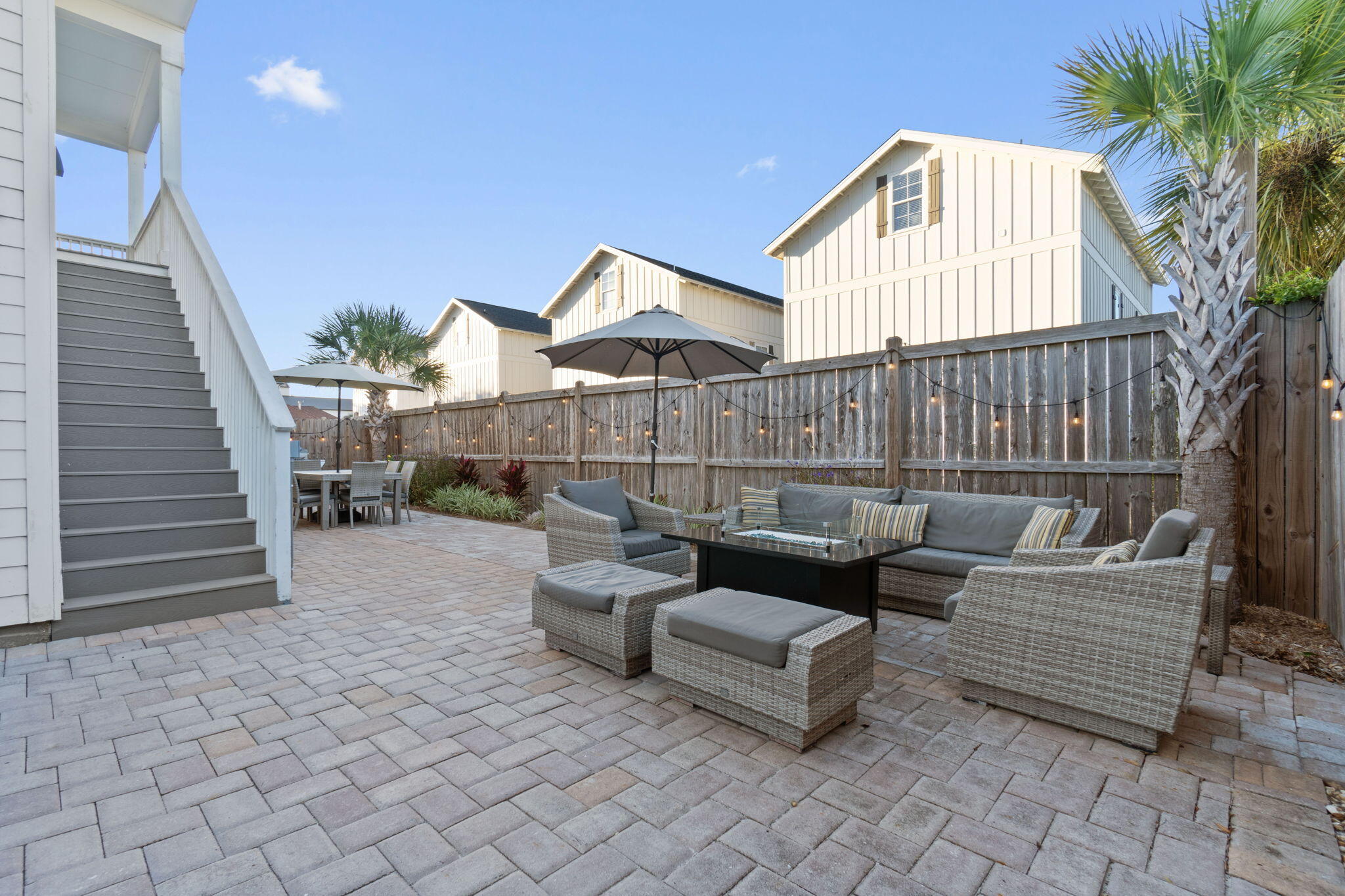 10 Blue Surf Lane Miramar Beach, FL 32550 - Photo 45 of 60 a view of a terrace with couches and potted plants