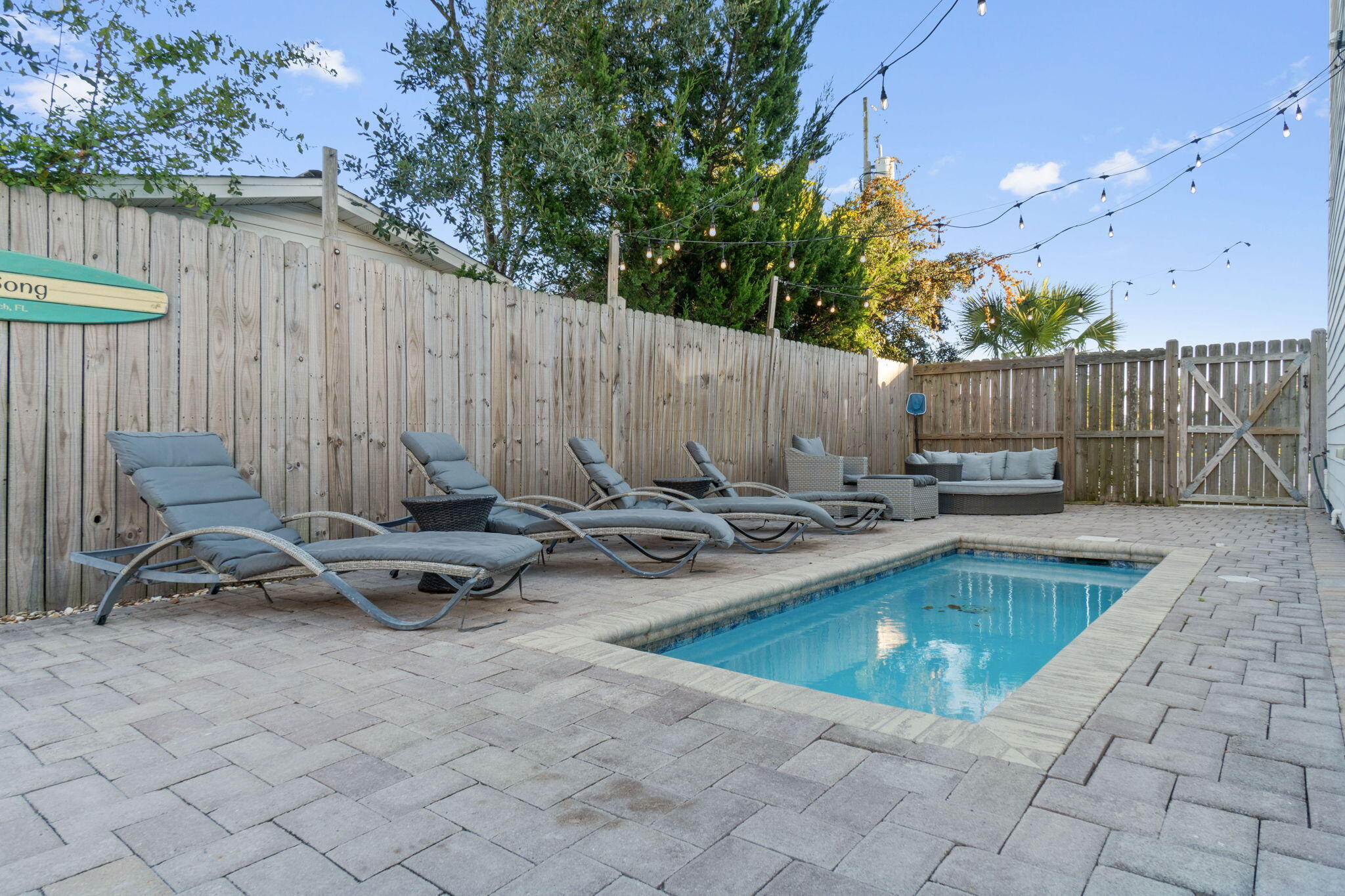 10 Blue Surf Lane Miramar Beach, FL 32550 - Photo 46 of 60 a view of a swimming pool with a patio