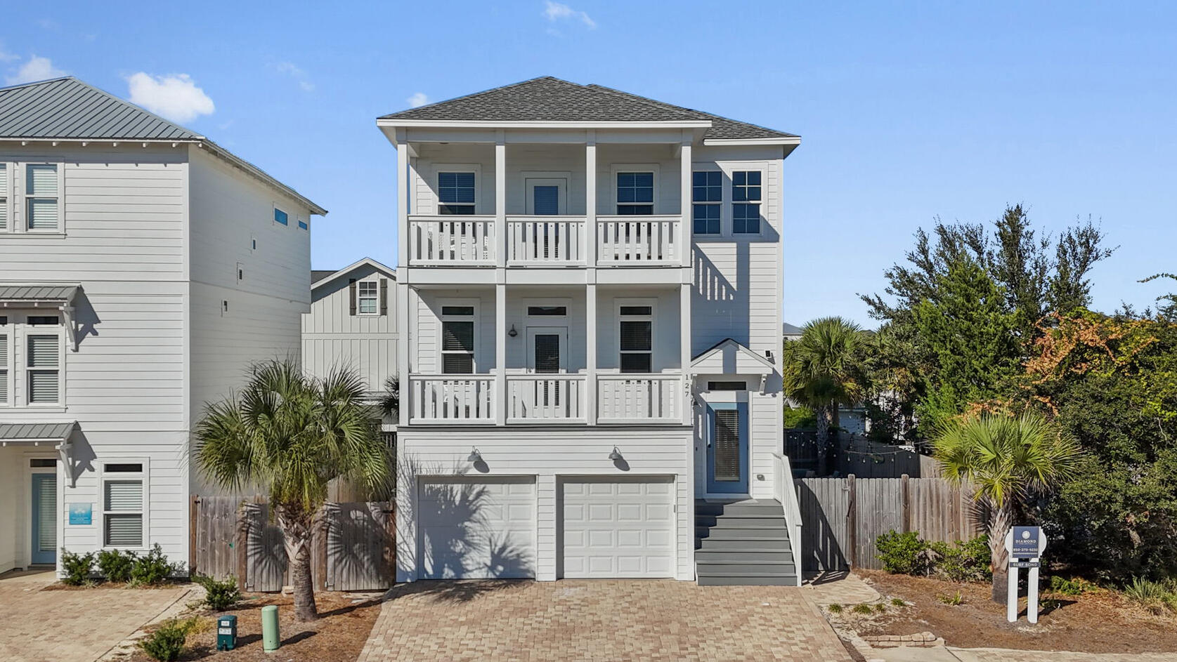 10 Blue Surf Lane Miramar Beach, FL 32550 - Photo 6 of 60 a front view of a house with a yard