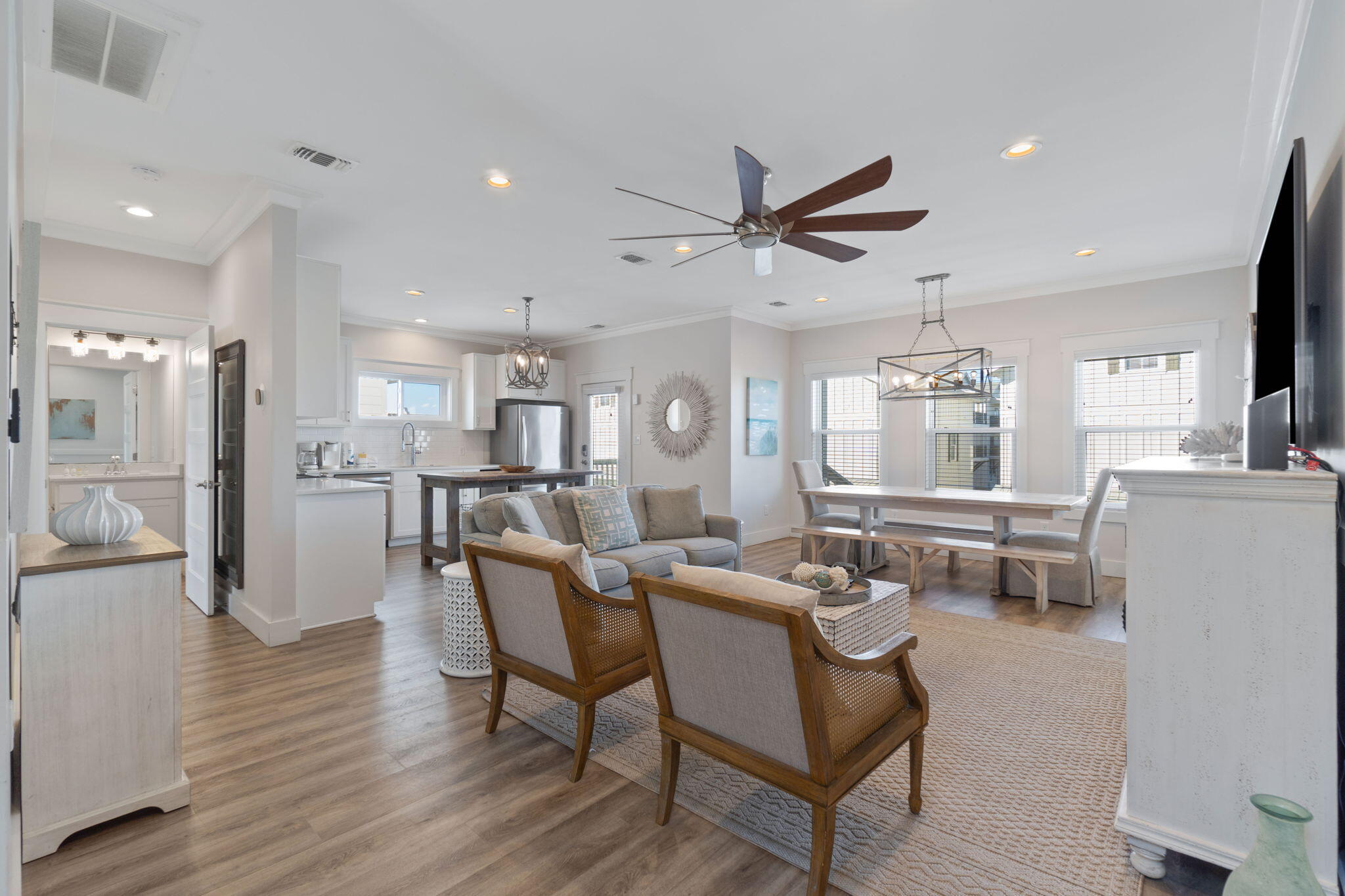 10 Blue Surf Lane Miramar Beach, FL 32550 - Photo 8 of 60 a view of a dining room and livingroom with furniture a rug a fireplace