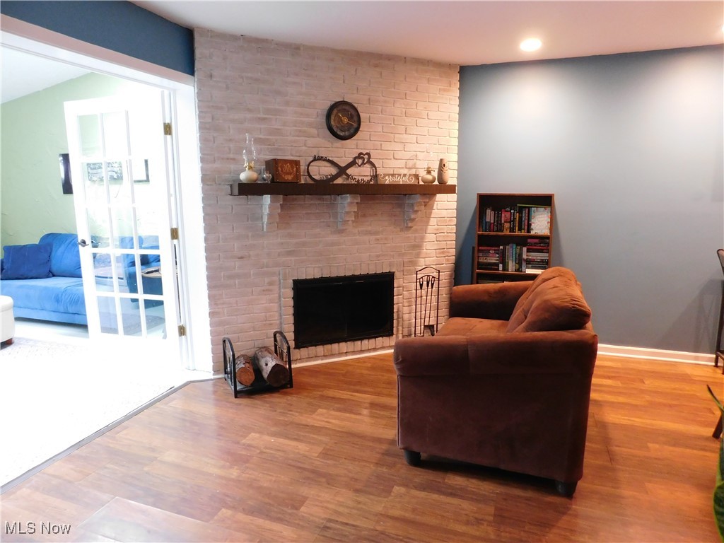 987 Hampton Ridge Drive Akron, OH 44313 - Photo 12 of 49 Multi purpose room w sitting area and fireplace. French doors to bonus room