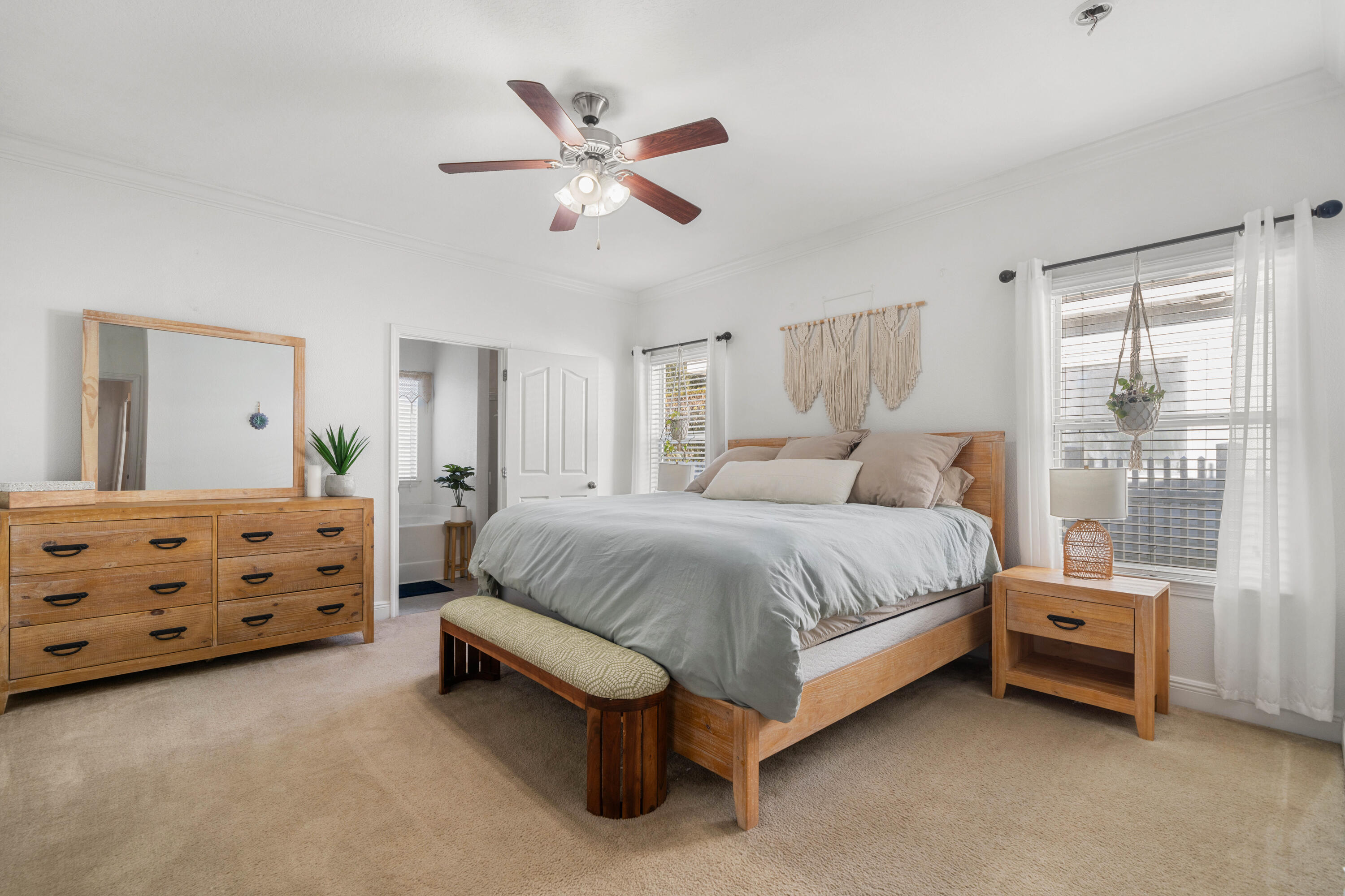 486 Fanny Ann Way Freeport, FL 32439 - Photo 14 of 58 a bedroom with a bed dresser and a window