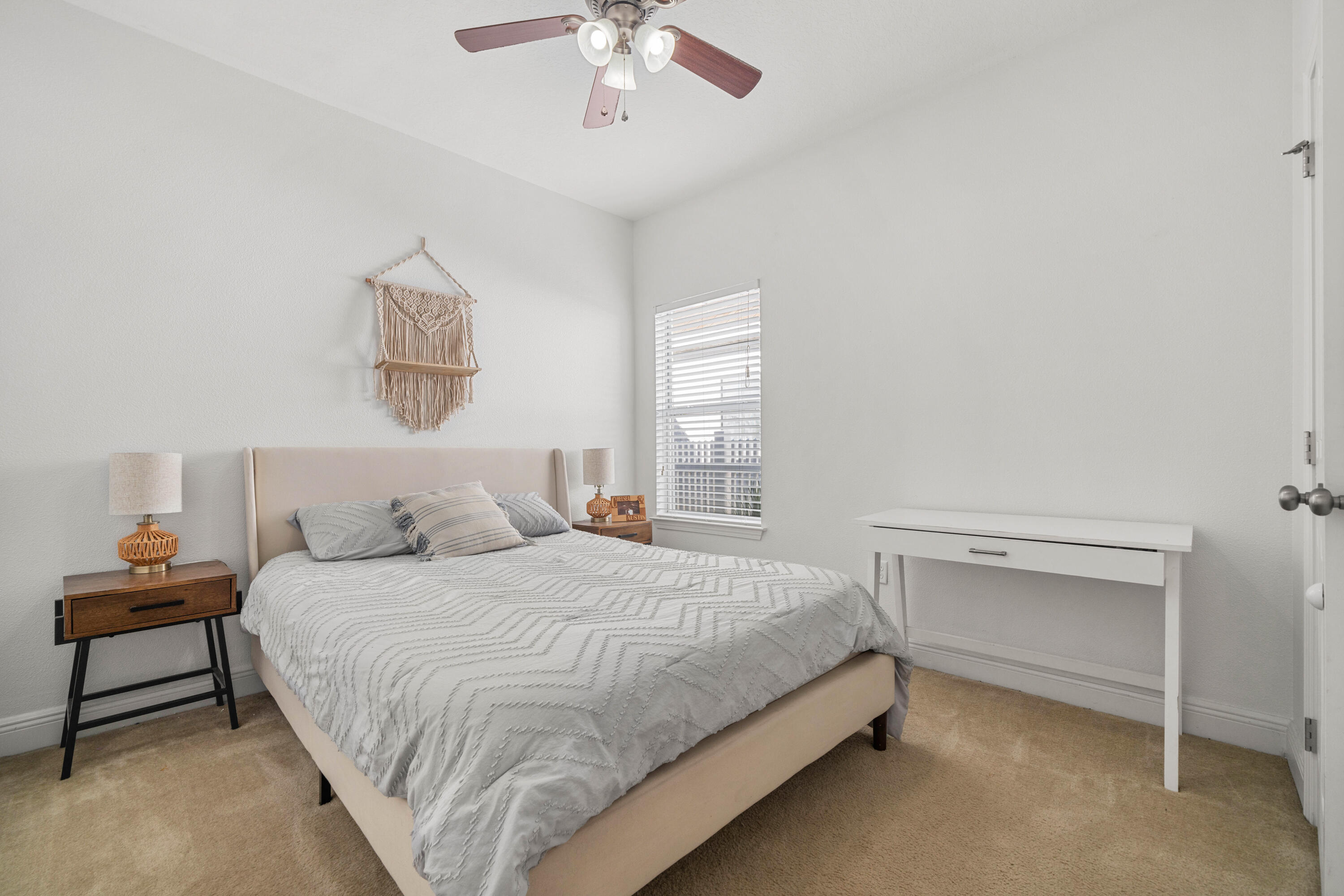 486 Fanny Ann Way Freeport, FL 32439 - Photo 23 of 58 a bedroom with a bed and a chandelier