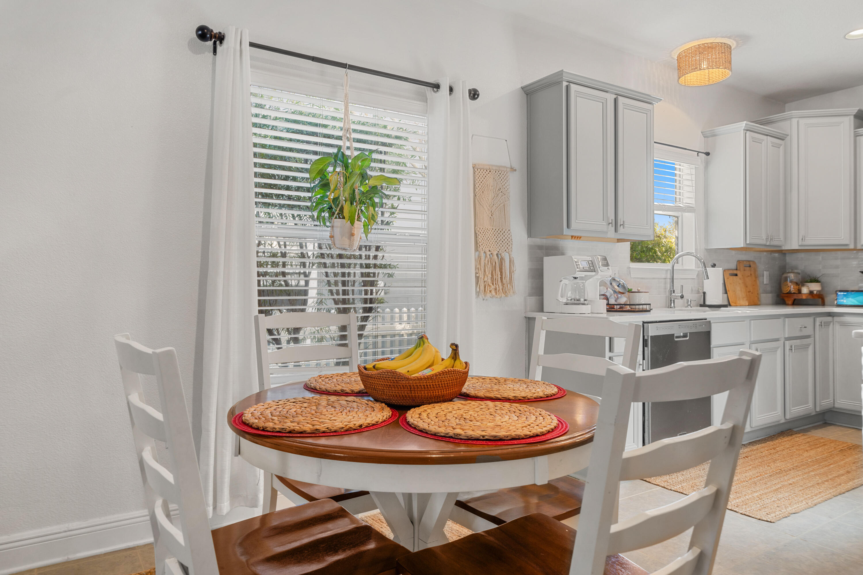 486 Fanny Ann Way Freeport, FL 32439 - Photo 6 of 58 a view of a dining room with furniture and a potted plant