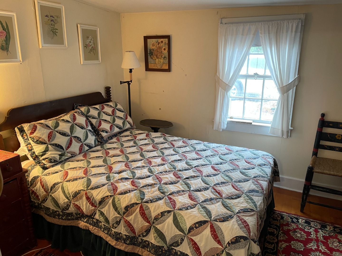 27 Pinehurst Road Edgartown, MA 02539 - Photo 2 of 6 a bedroom with a bed and a window
